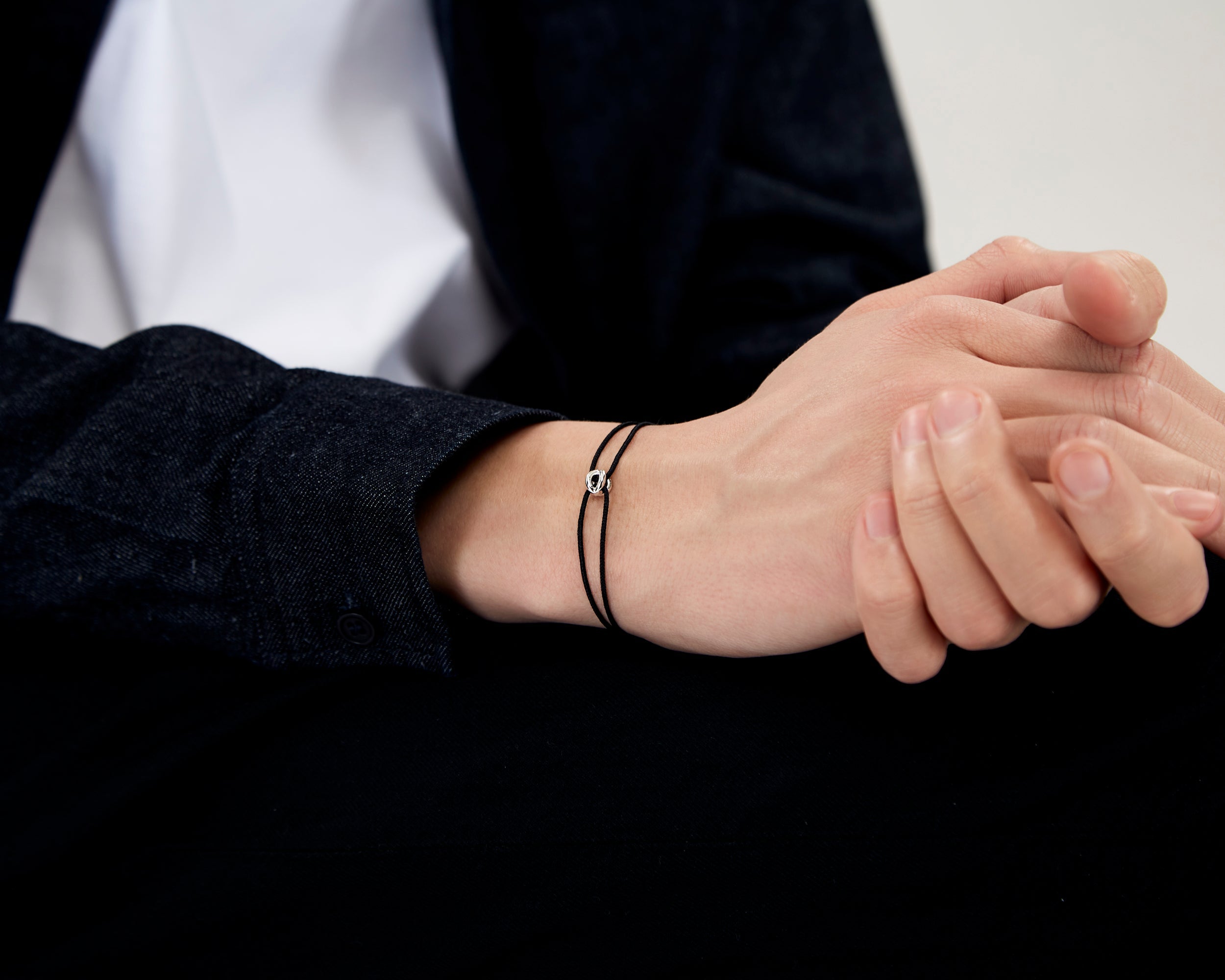 bracelet cordon entrelacs noir le 1g